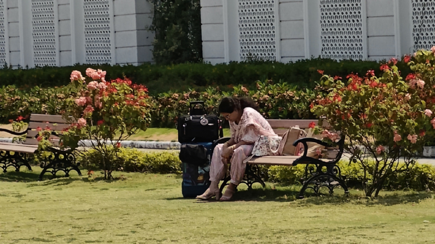 Manu Bhakers mother sits in a bench in the central lawns of Bhopals shooting range Express Photo by Mihir Vasavda